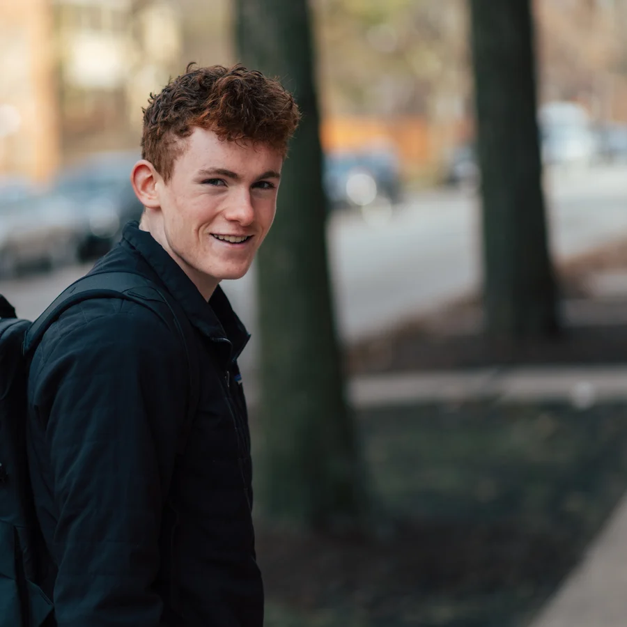 Ryan McComb on a tree-lined street